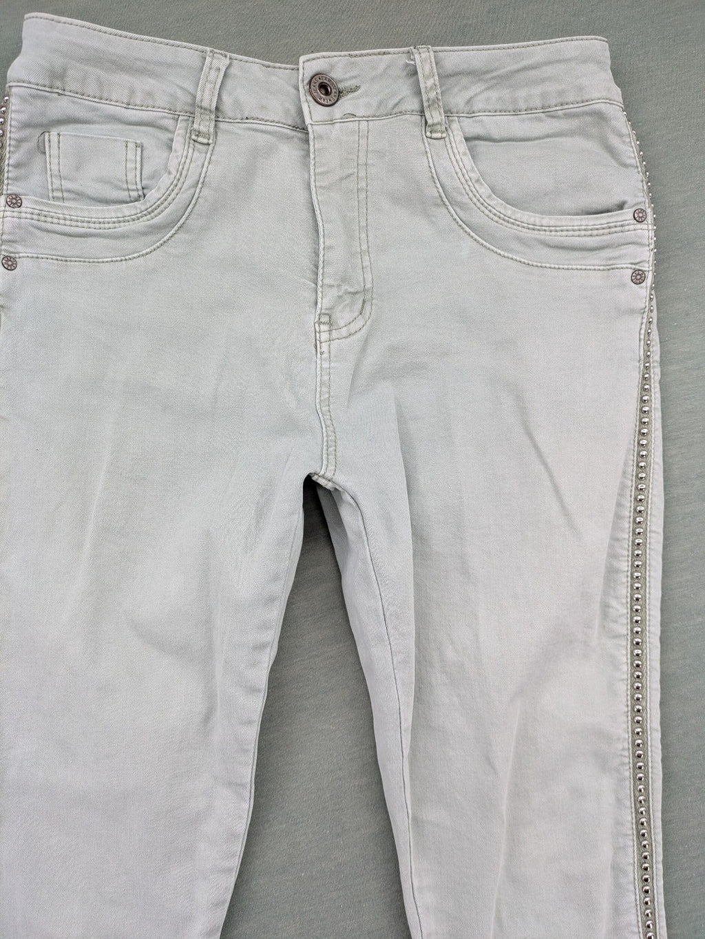 Jewelly grey straight jeans slim fit with silver decorative studs along side seams.