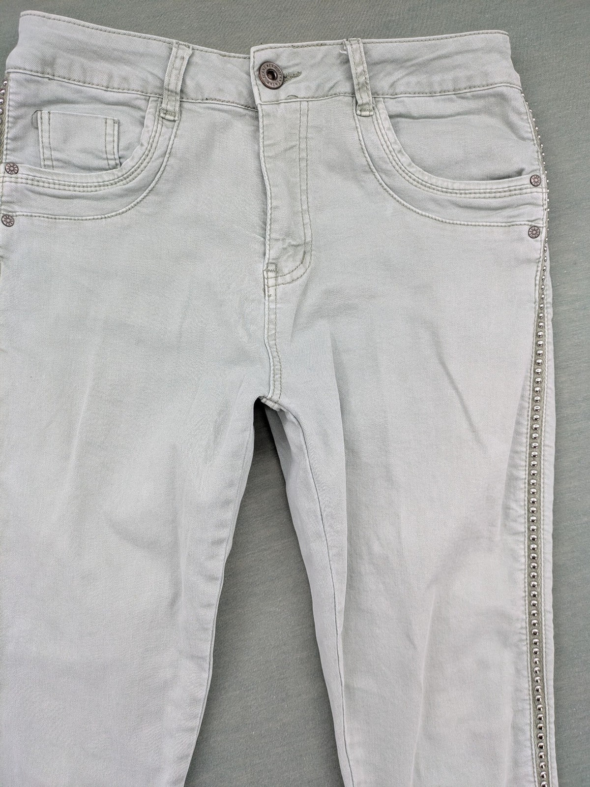Jewelly grey straight jeans slim fit with silver decorative studs along side seams.