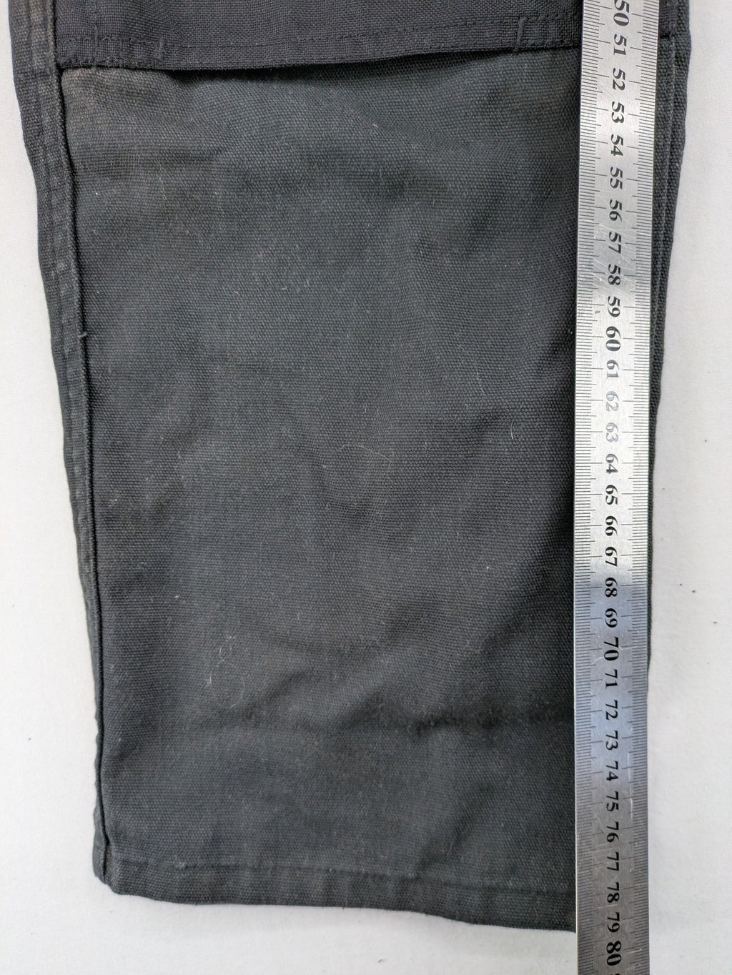 Planam work trousers black canvas with Cordura knee reinforcement and cargo pockets.