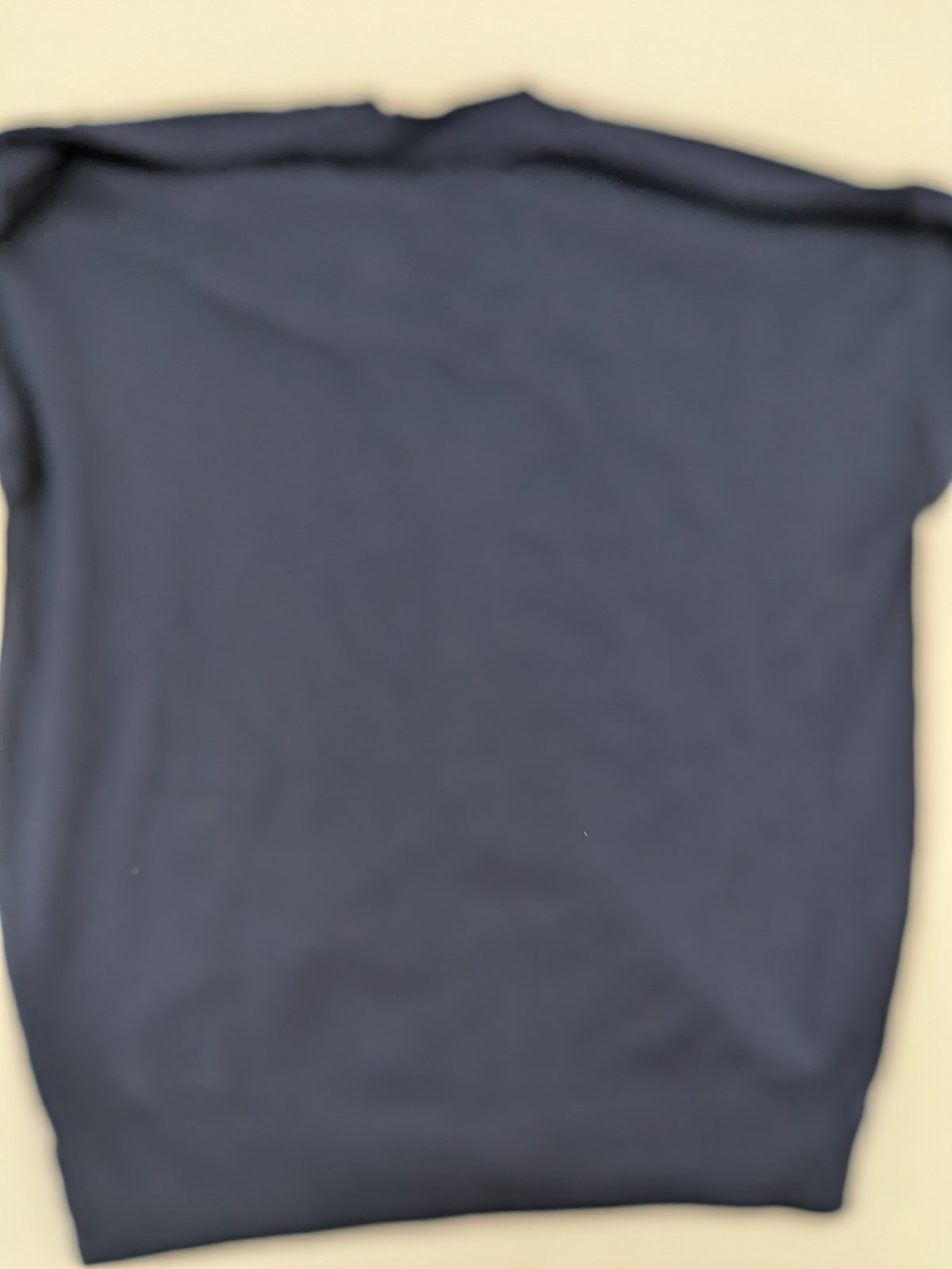 Schurwolle navy knit jumper classic V-neck with button placket, made from wool blend.