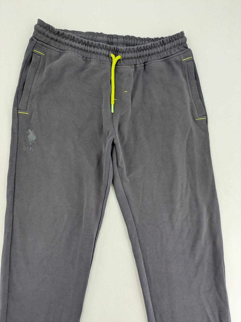 US Polo Assn grey sweatpants with light green drawstring and subtle logo detail.