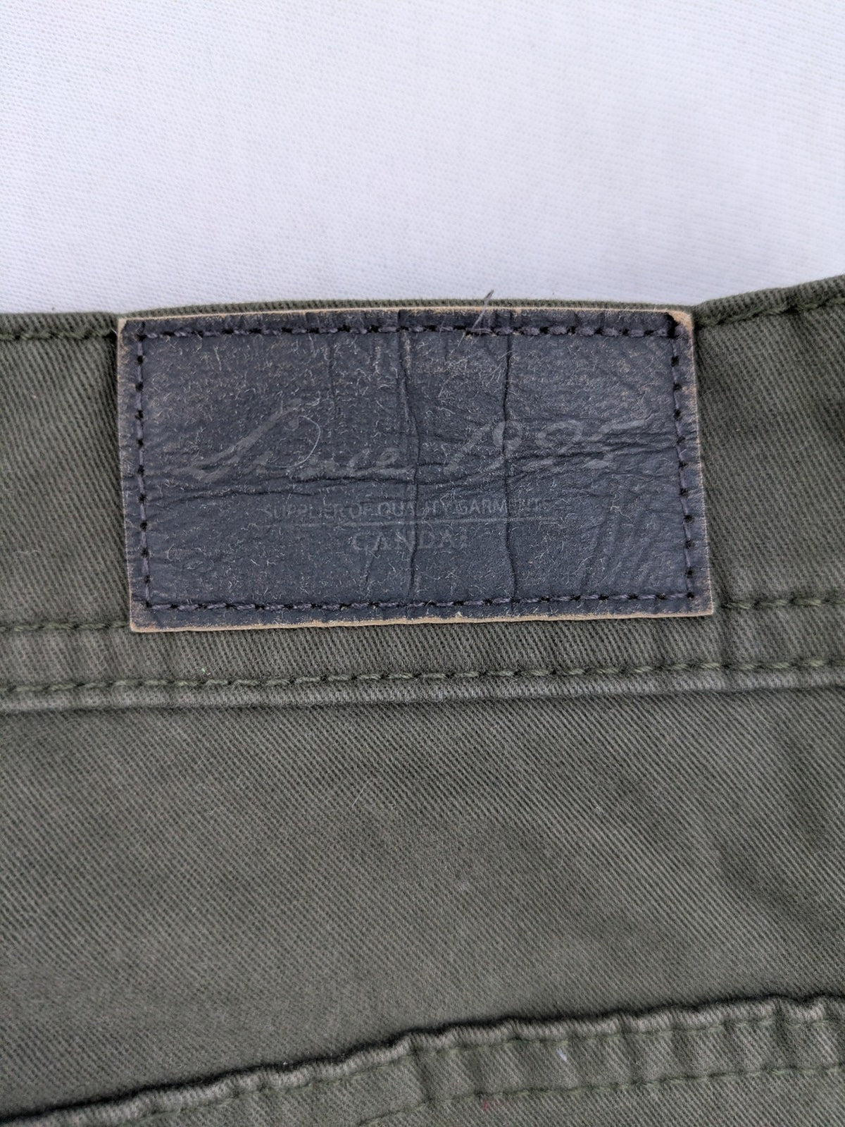 Canda khaki straight jeans 5-pocket design with stretch cotton material.