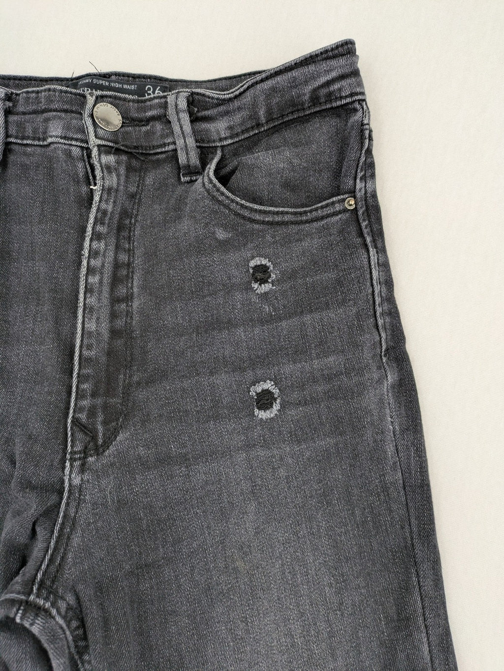Stradivarius grey skinny jeans super high waist distressed with classic five-pocket design.