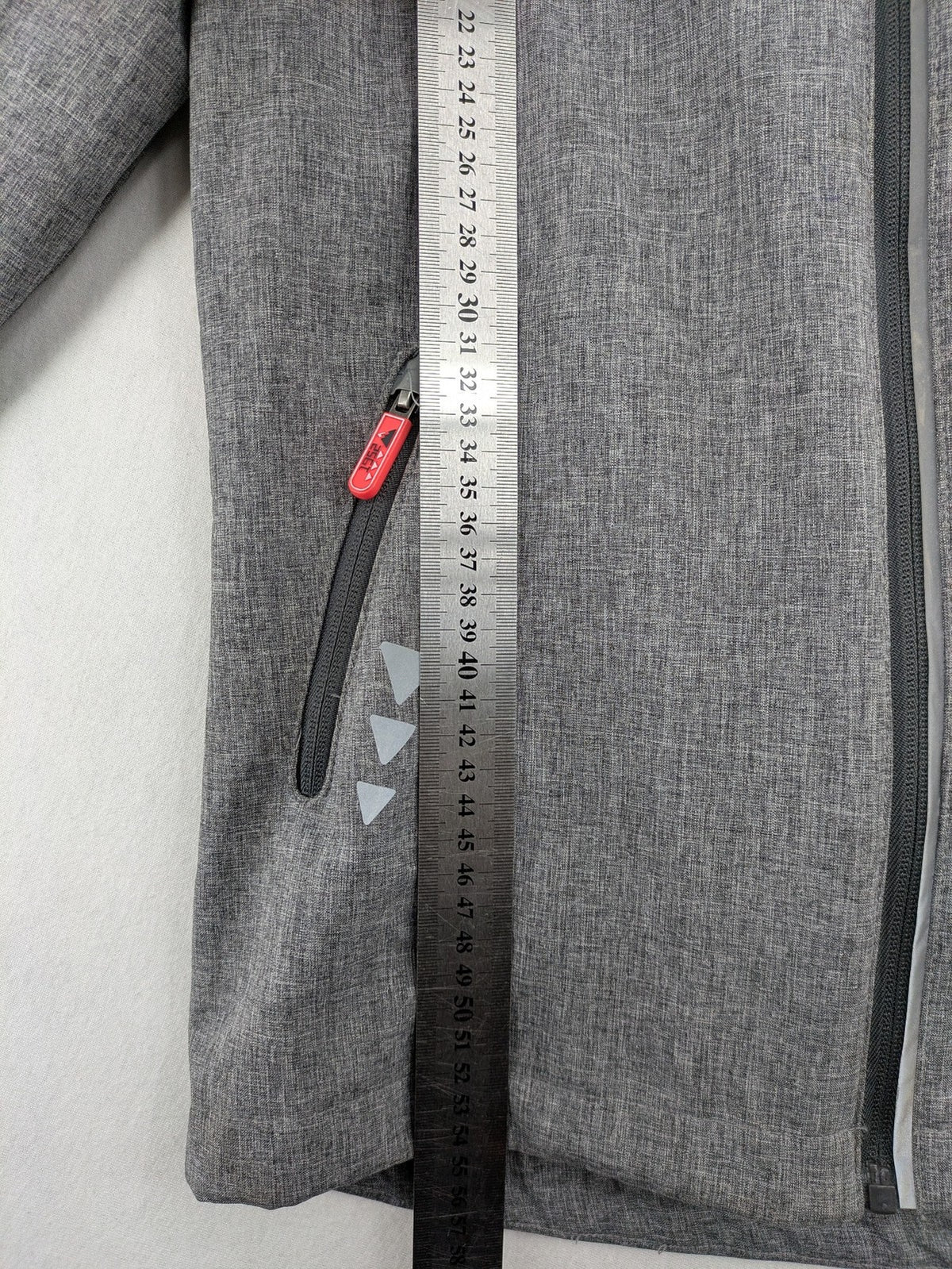 Northville grey and red softshell jacket with hood, fleece lining, and reflective elements.