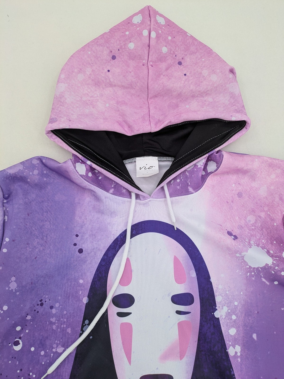 Lila zip-through hoodie multi-coloured featuring No Face graphic, front kangaroo pocket, drawstring hood.