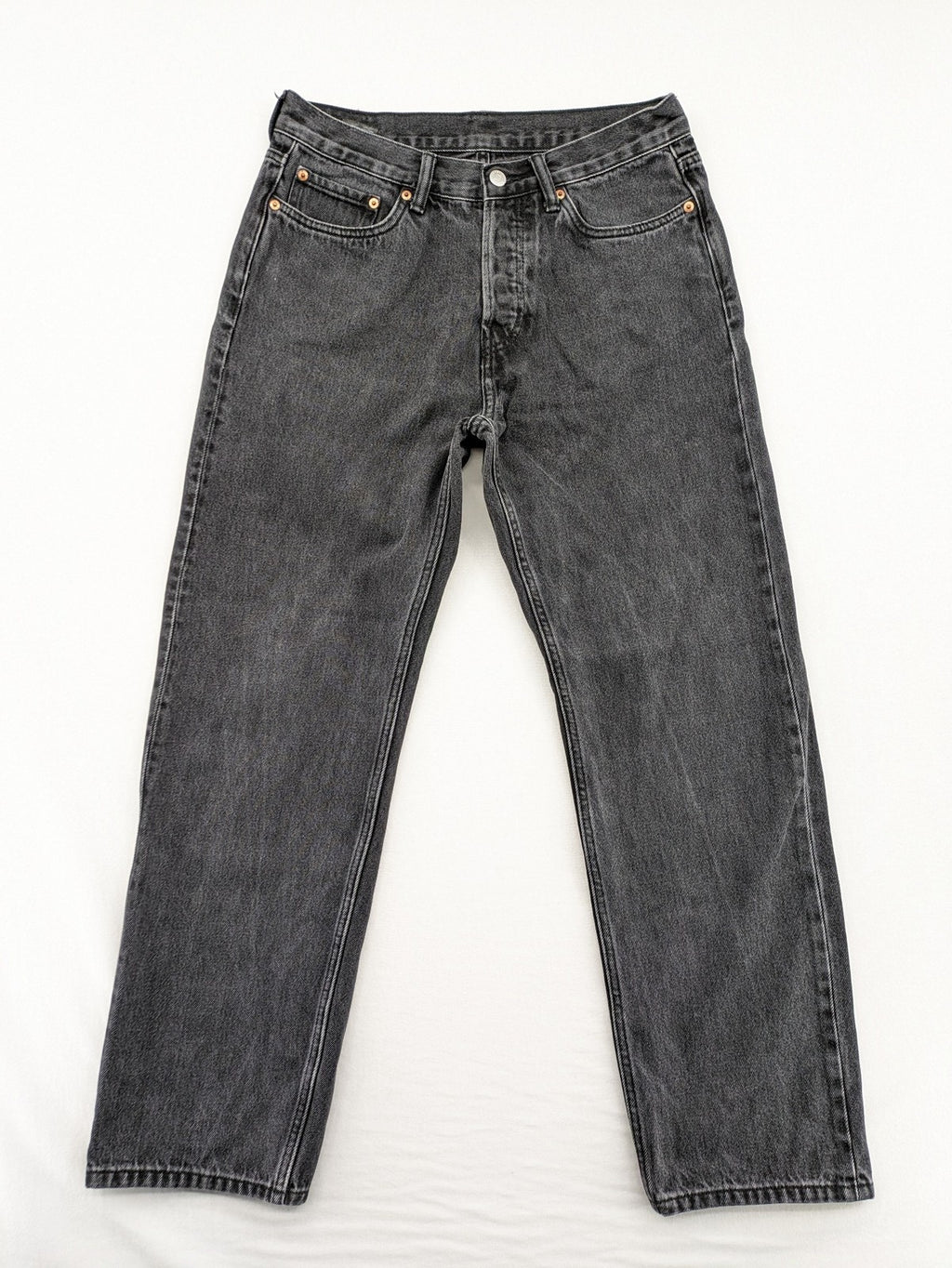 Weekday grey straight jeans with button fly and classic denim design.