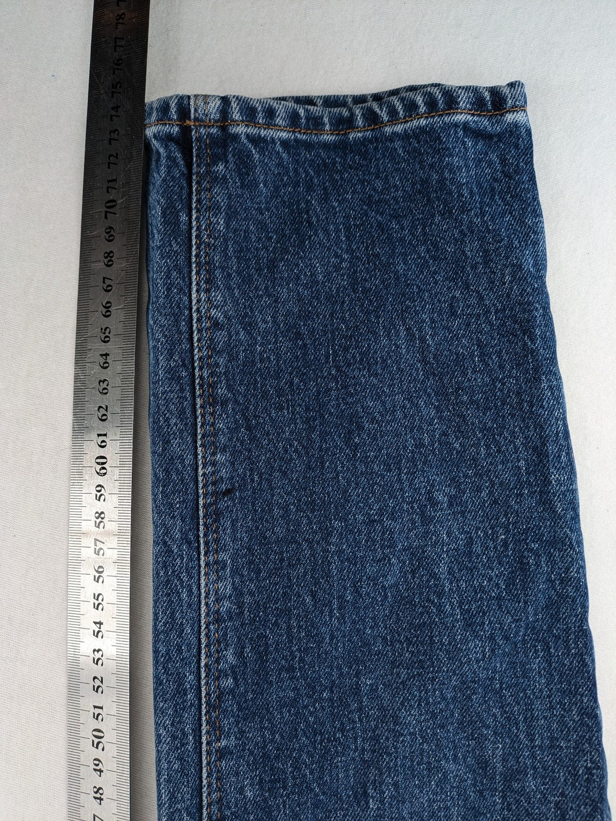 Zara blue straight jeans with classic 5-pocket design and button fly.