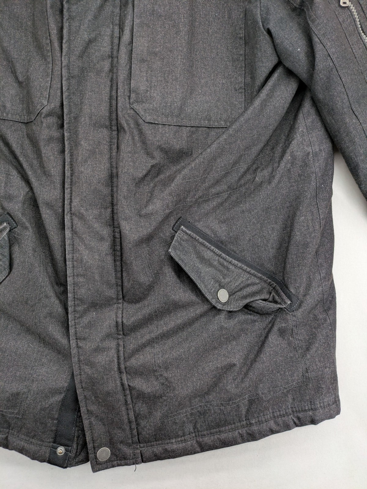 Rover & Lakes grey jacket with hood, quilted lining, and multiple pockets.