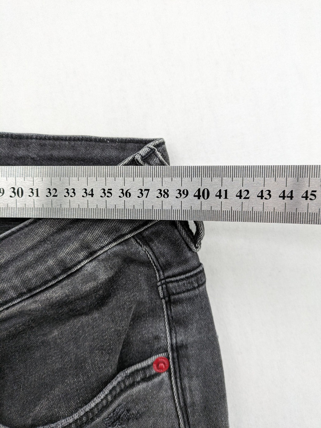 Elias Rumelis grey super slim fit jeans with stitched logo and subtle used look.