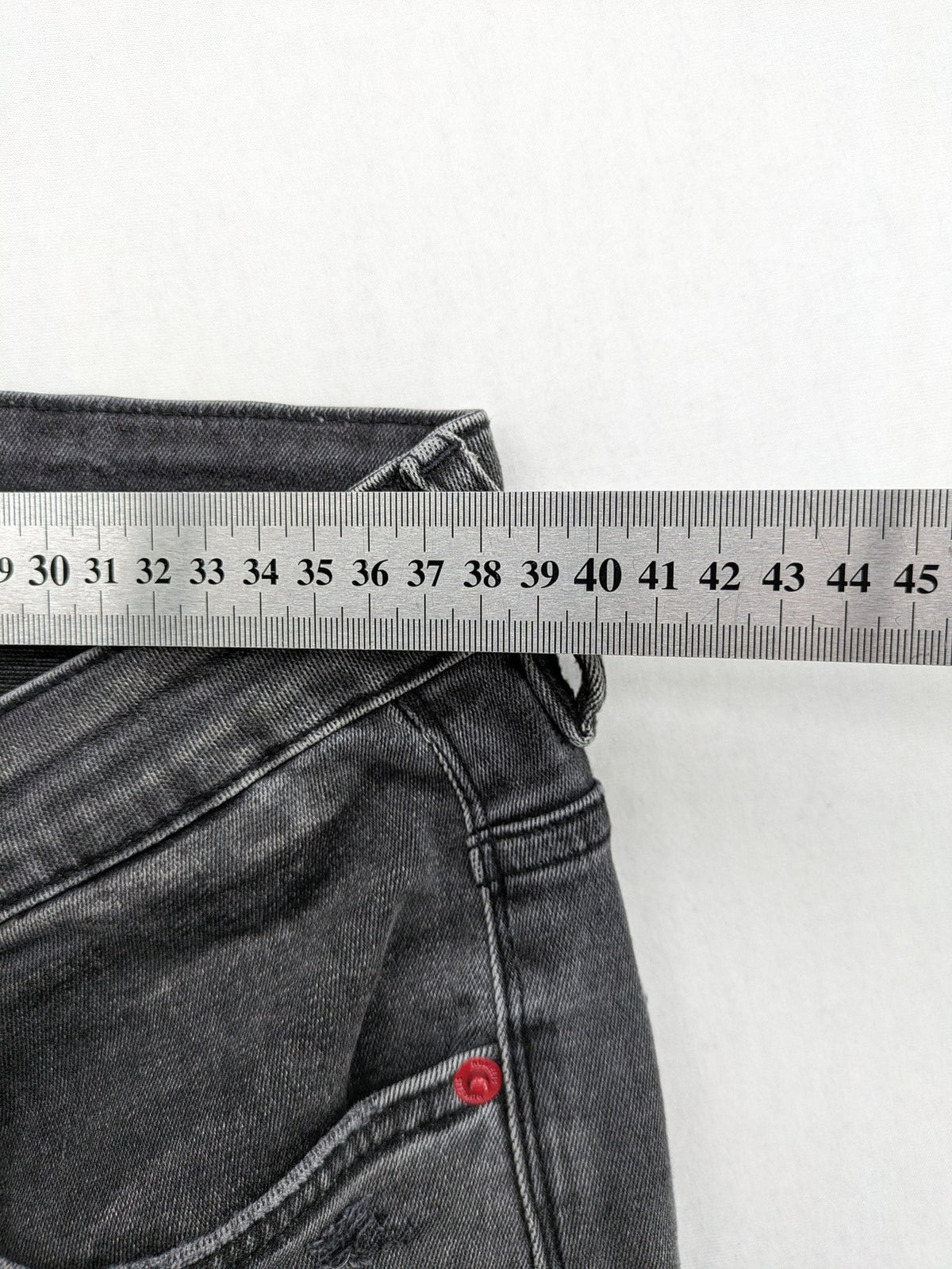 Elias Rumelis grey super slim fit jeans with stitched logo and subtle used look.