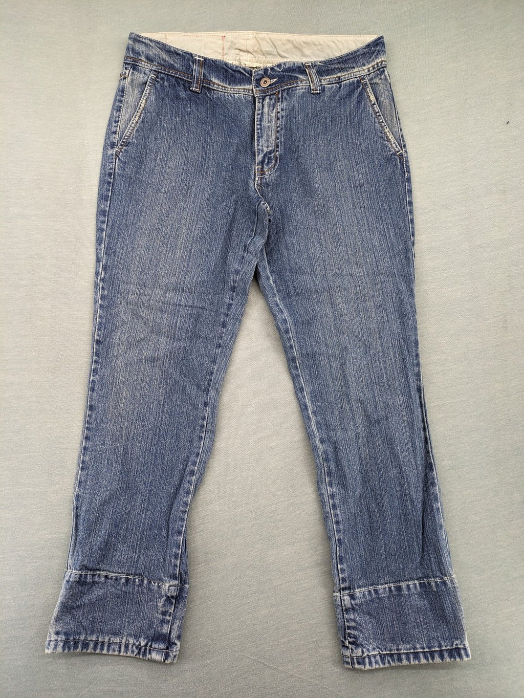 Stefanel blue straight jeans with cuffed hem and classic 5-pocket design.