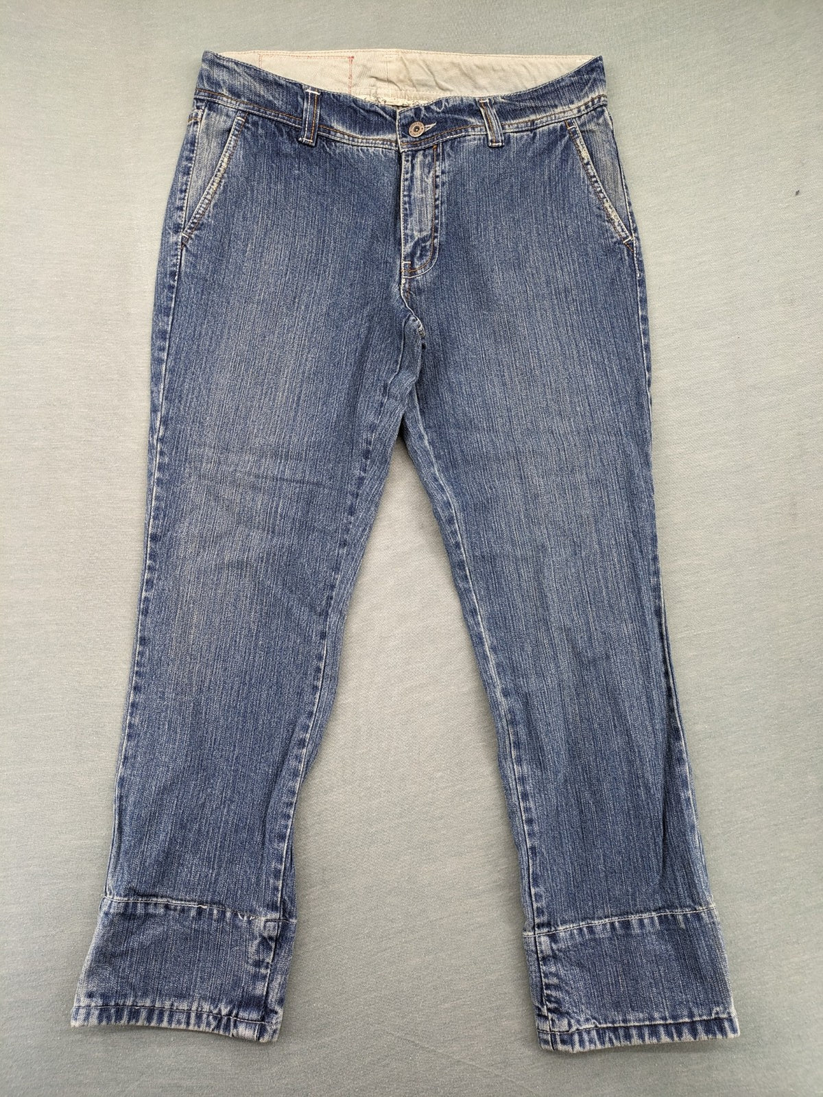 Stefanel blue straight jeans with cuffed hem and classic 5-pocket design.