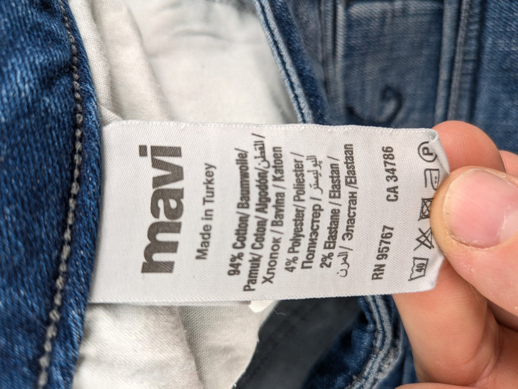 Mavi blue straight leg jeans with classic 5-pocket styling and medium wash.