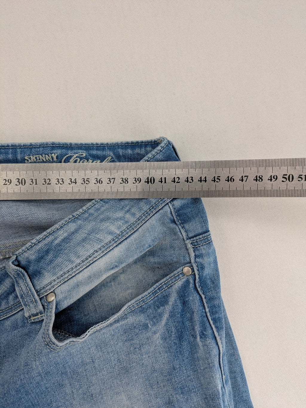 ONLY skinny jeans superlow coral orange pink distressed denim with modern used-look details.