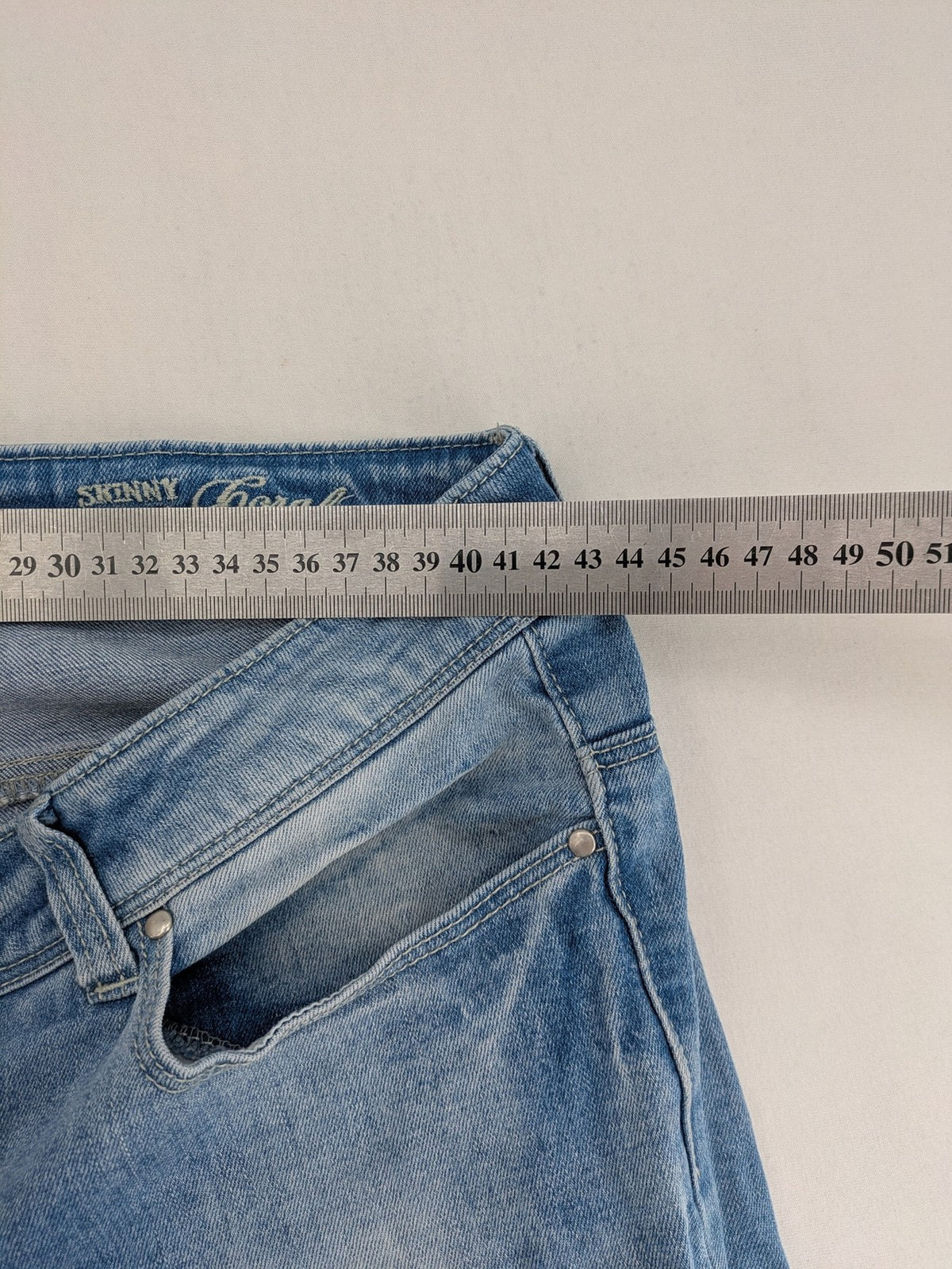 ONLY skinny jeans superlow coral orange pink distressed denim with modern used-look details.