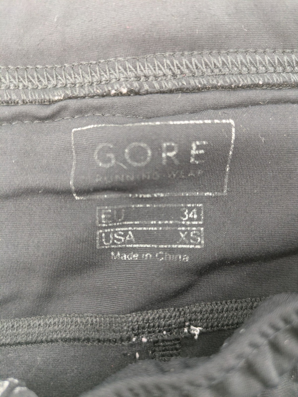 GORE RUNNING WEAR black bicycle tights with reflective details and zippered ankle openings.