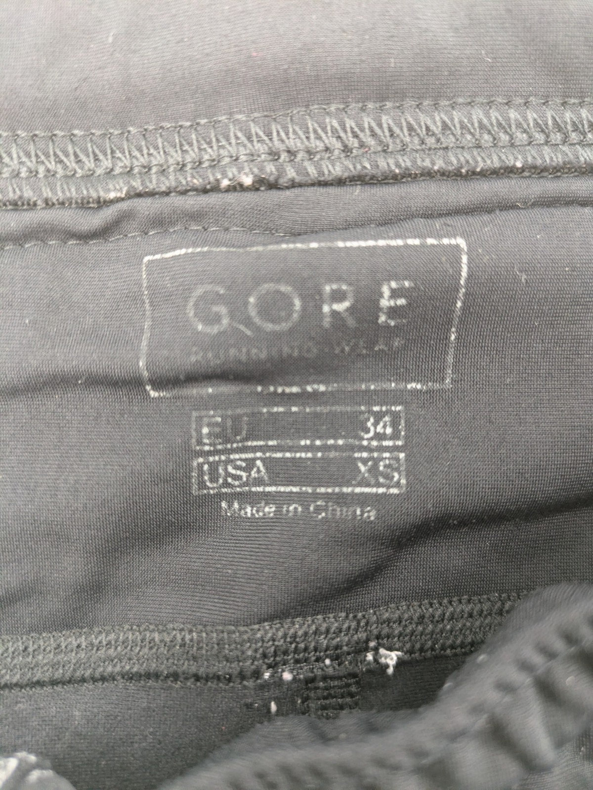 GORE RUNNING WEAR black bicycle tights with reflective details and zippered ankle openings.