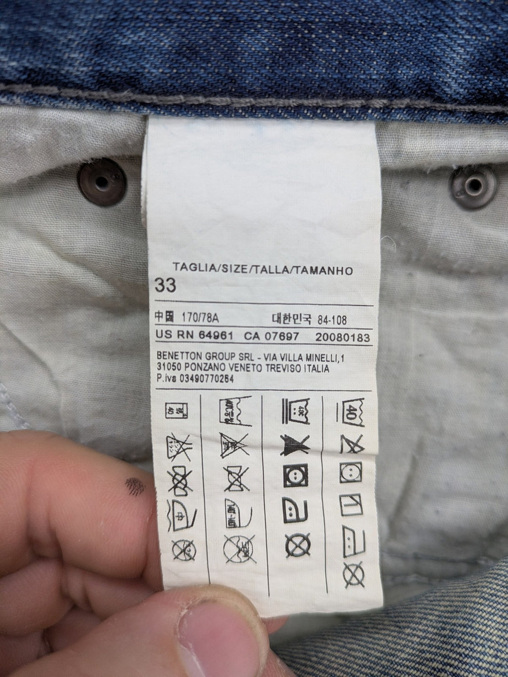 Benetton Jeans blue straight leg denim with button fly and classic design.