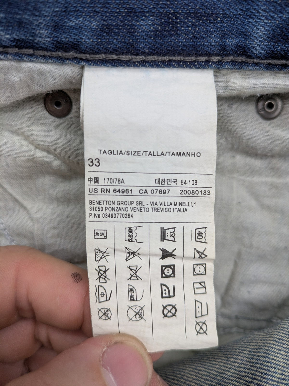 Benetton Jeans blue straight leg denim with button fly and classic design.