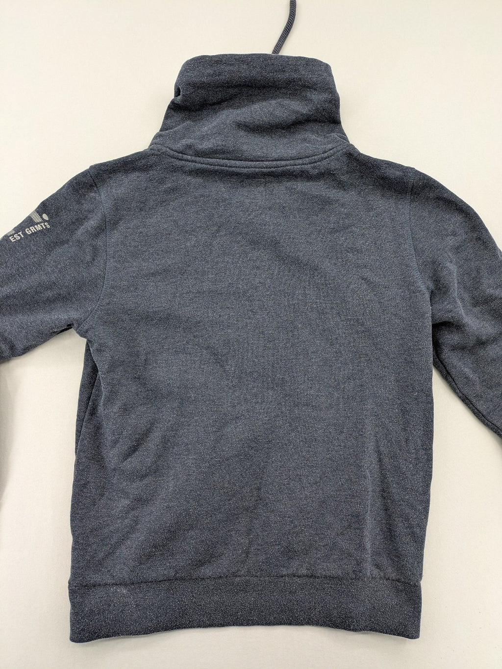 s.Oliver green turtle neck sweatshirt with adjustable drawstrings and graphic detail on sleeve