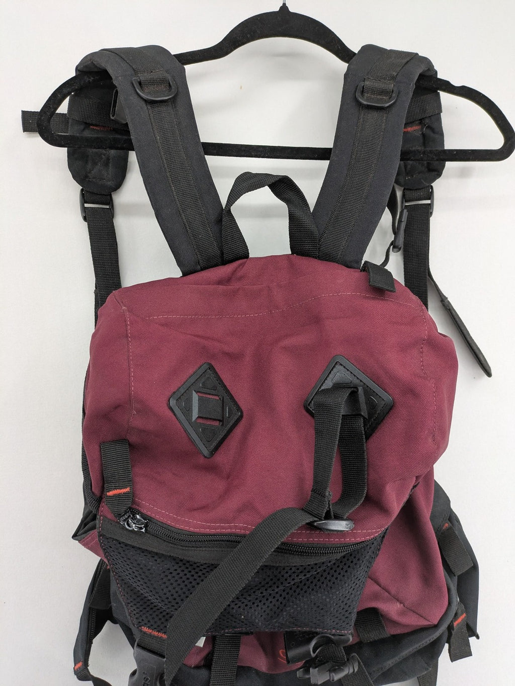Adidas burgundy vintage rucksack with logo, Teflon fabric, and drawstring closure.