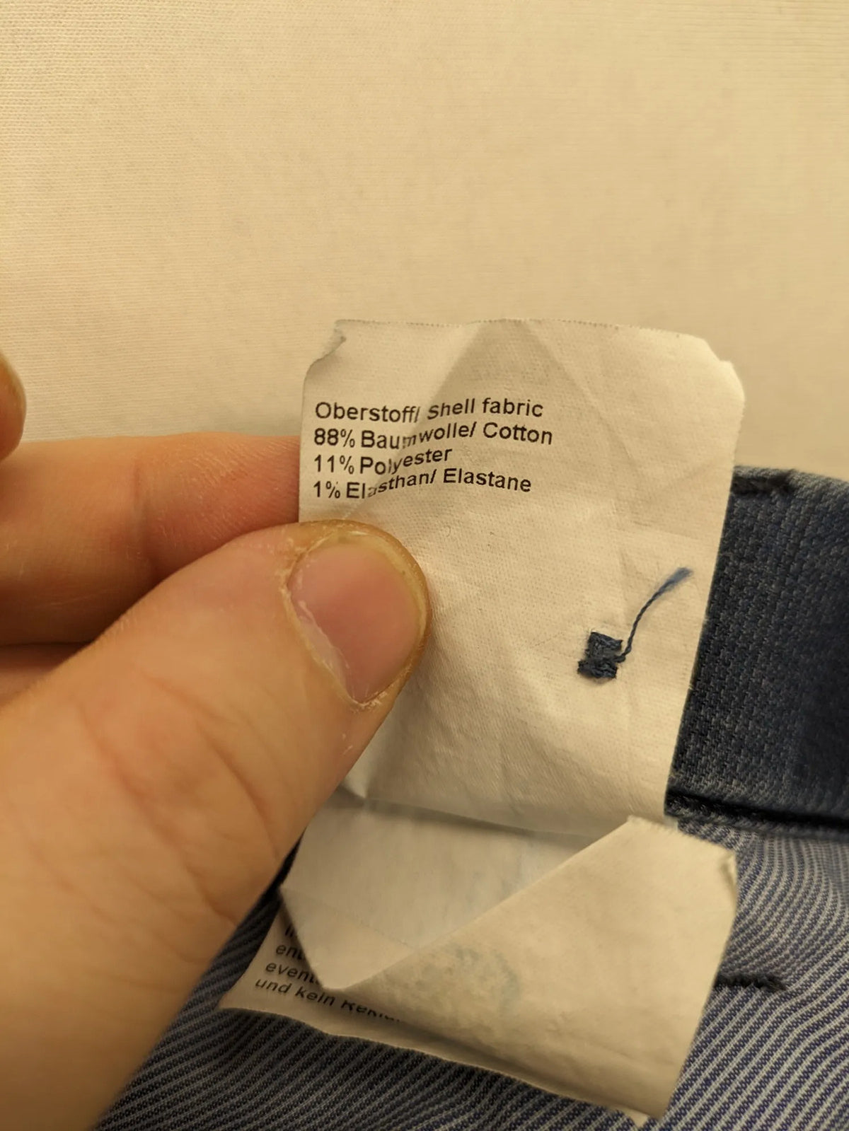 Avena blue chino pants, straight leg, cotton blend, featuring zipper and buttoned pockets.