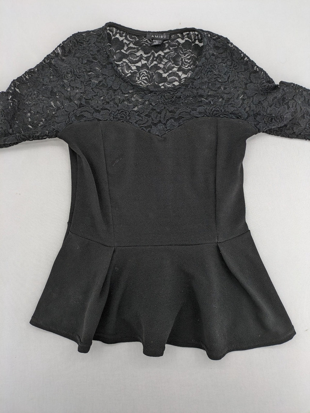 Amisu black peplum top with floral lace sleeves and delicate lace trim.