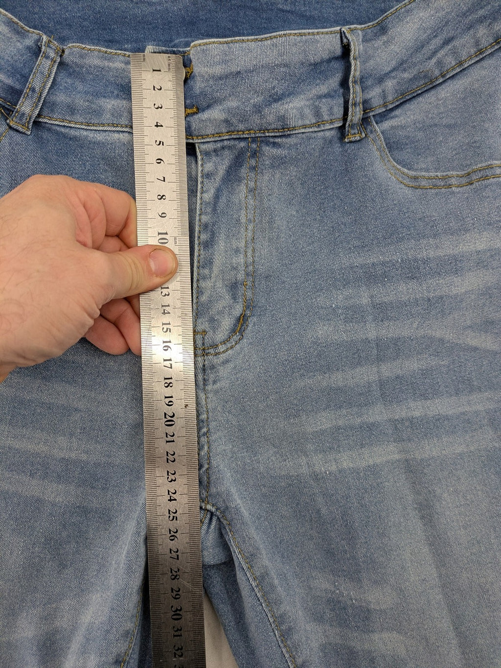C&A blue bootcut jeans high waist stretch denim with double button closure.