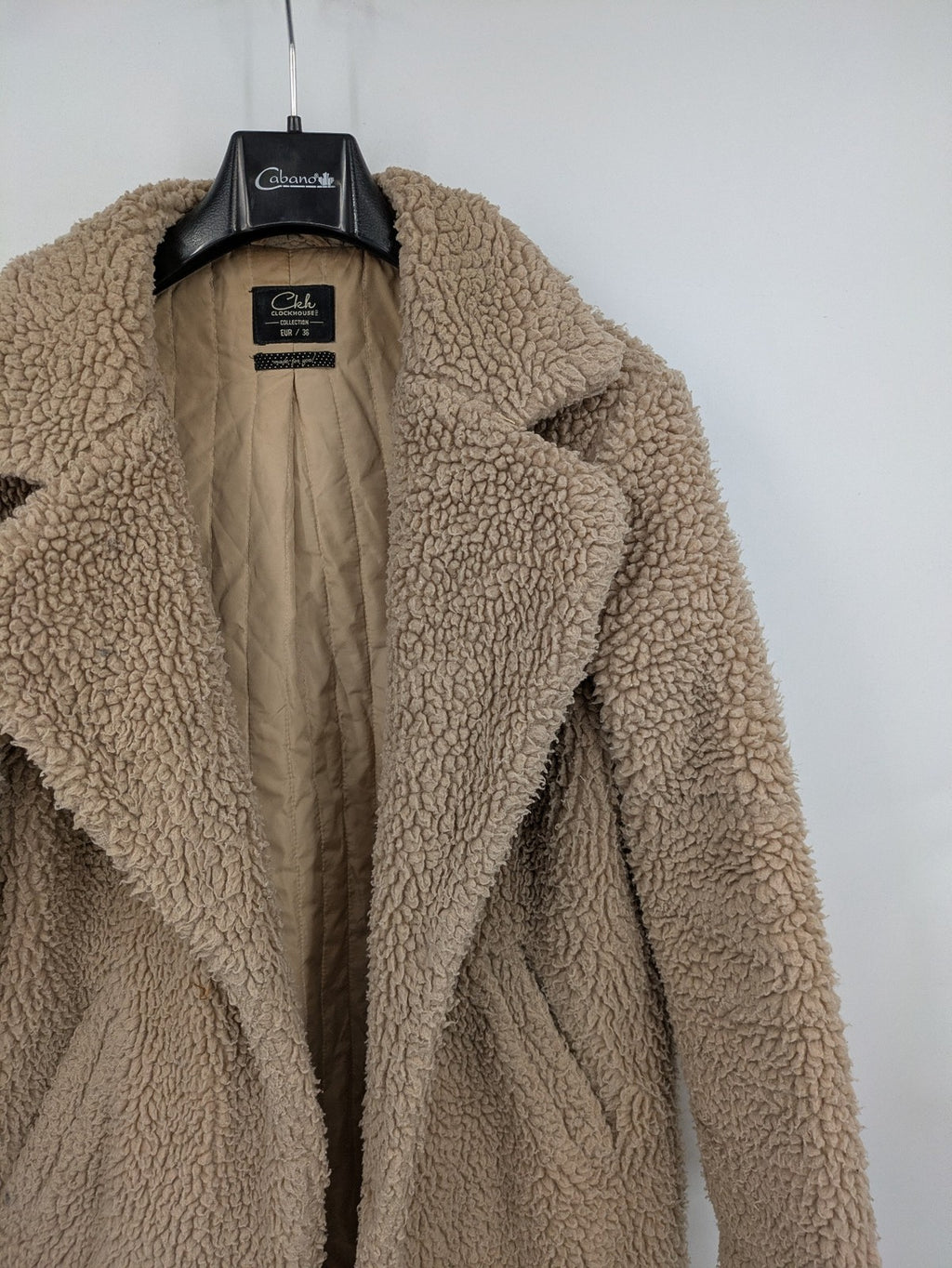 Clockhouse beige teddy coat longline design soft faux fur material with notched collar.