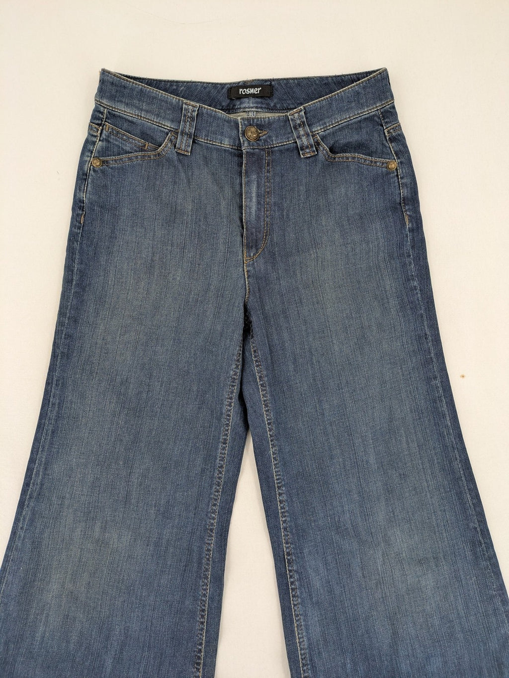 Rosner blue wide leg jeans with colorful embroidery on back pockets.