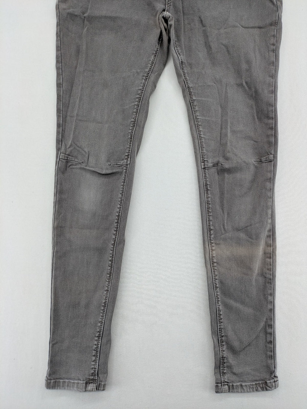 Made in Italy grey biker jeans with zip pockets and structured knee detailing.