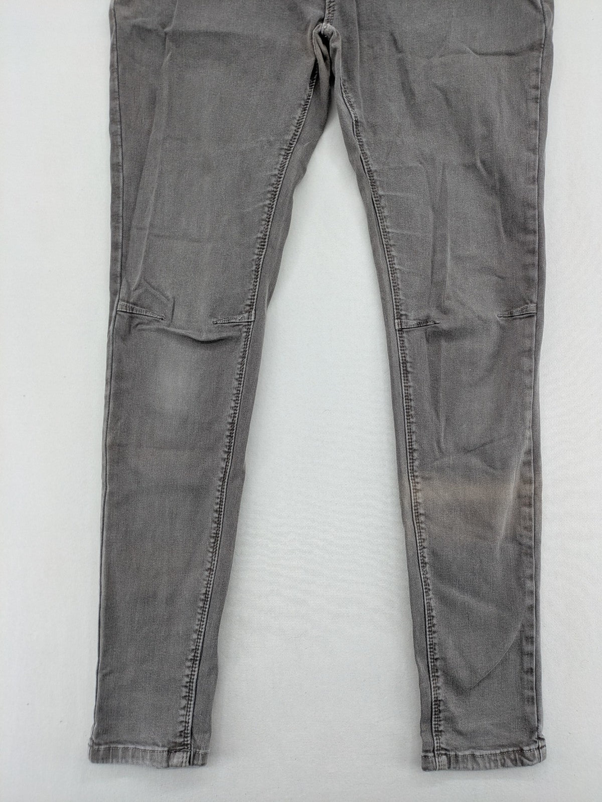 Made in Italy grey biker jeans with zip pockets and structured knee detailing.