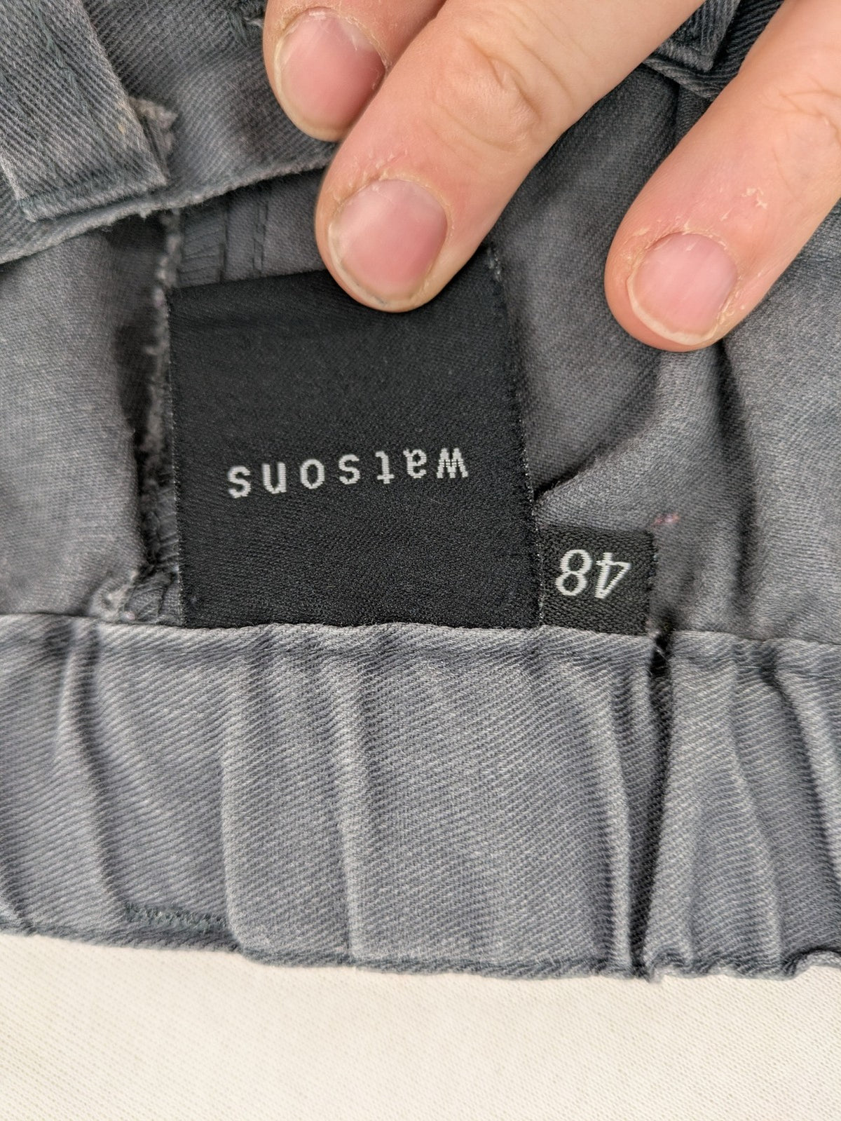 Watsons grey and black hunting tactical pants with Cordura reinforcements and elastic waistband.