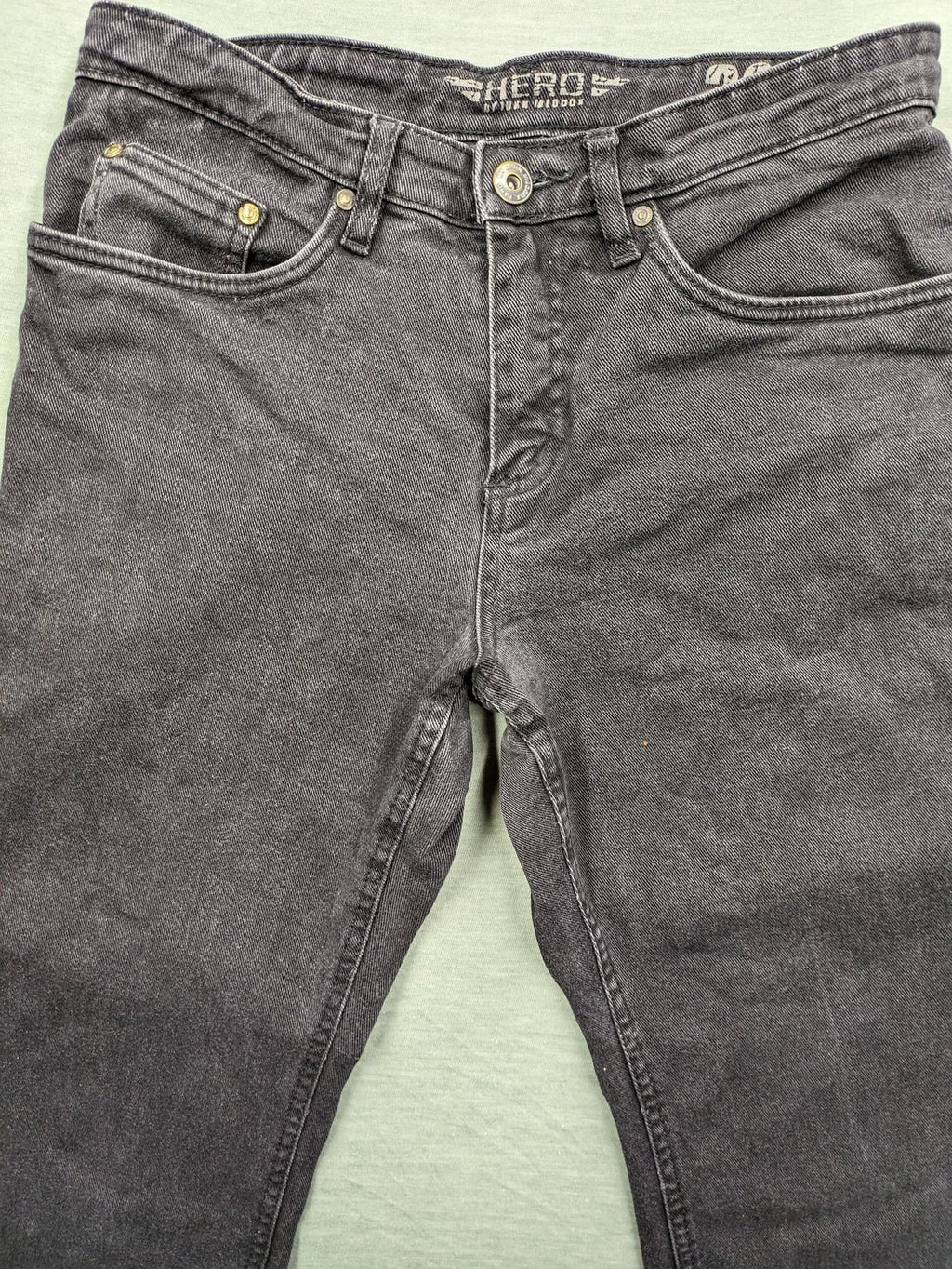 Hero by John Meddox black straight jeans with faded wash and durable cotton-stretch material.