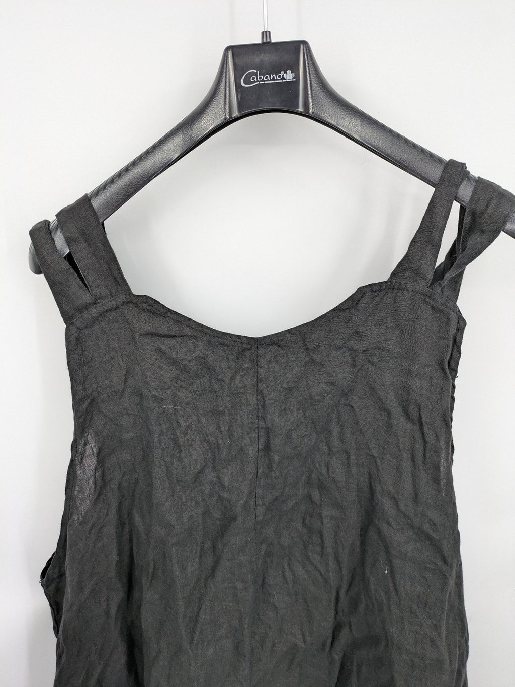 Lagenlook black linen bridal party dress asymmetrical cut with checkered hem and diagonal zipper.