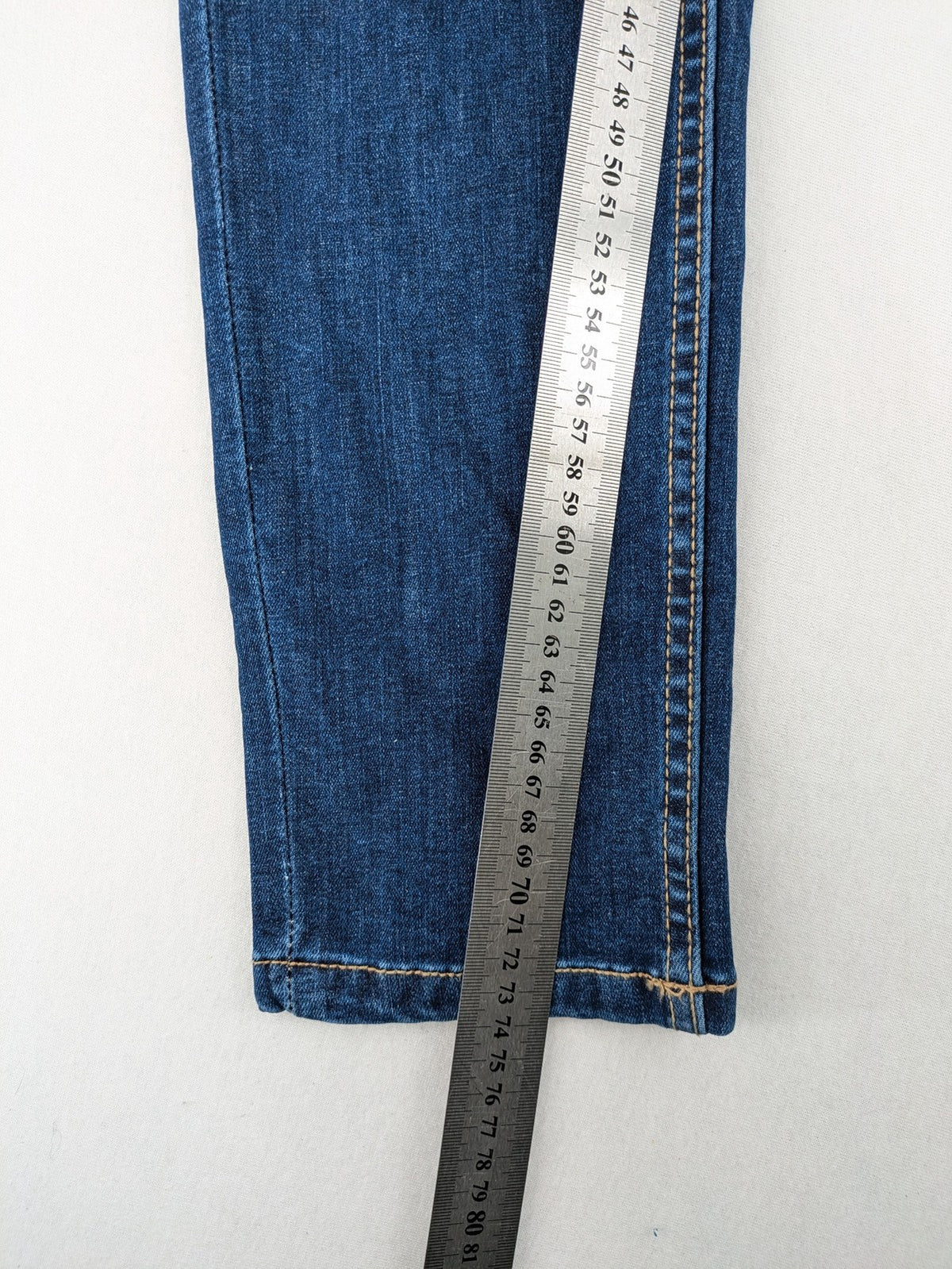 ESMARA blue super skinny jeans with dark wash and stretch denim material.