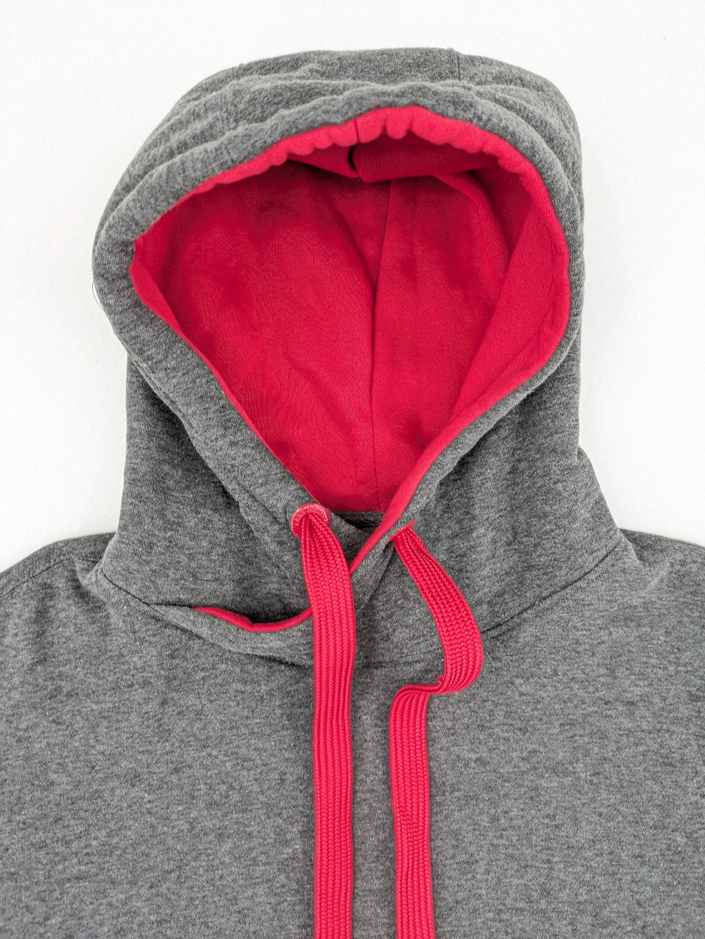 Bolf grey hoodie with pink contrast hood, kangaroo pocket, and ribbed cuffs.