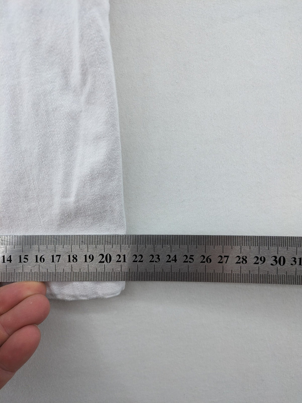 Canda white capri pants cotton-elastane blend with decorative zippers and stylish pockets.