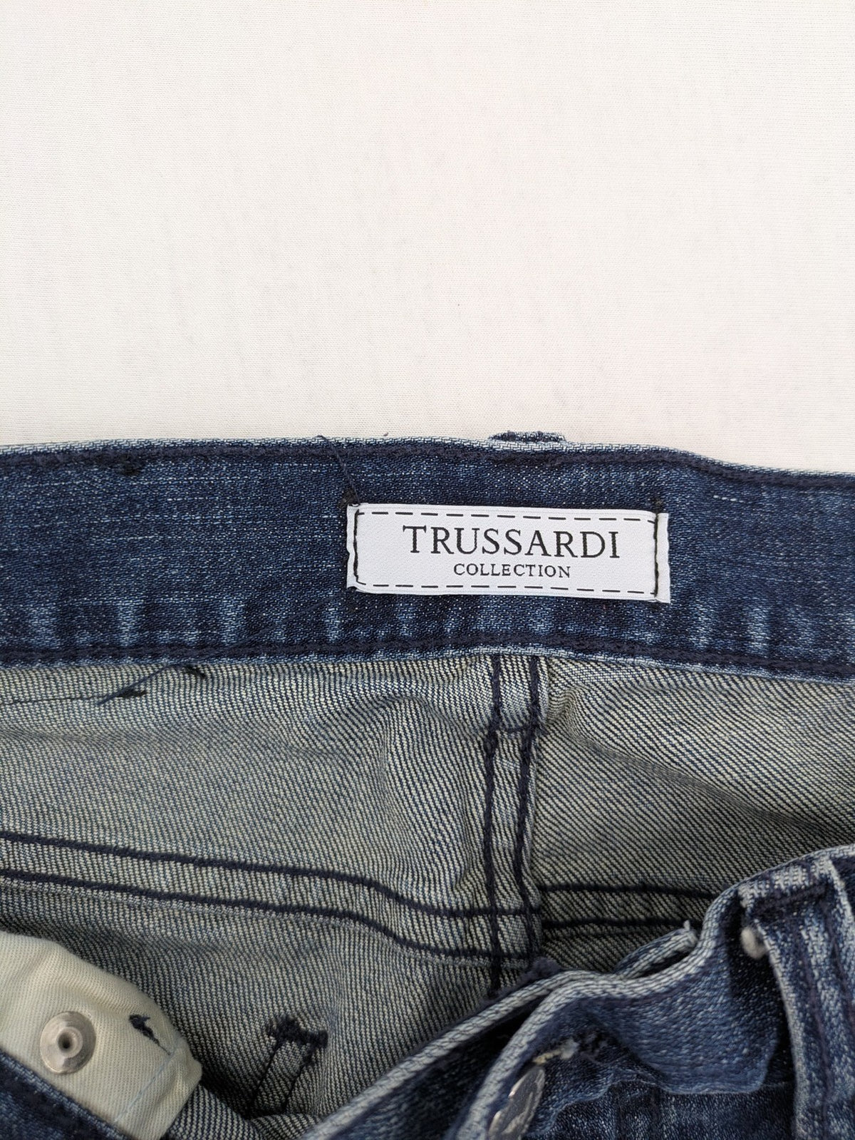 Trussardi blue straight jeans with classic 5-pocket design and durable denim material.