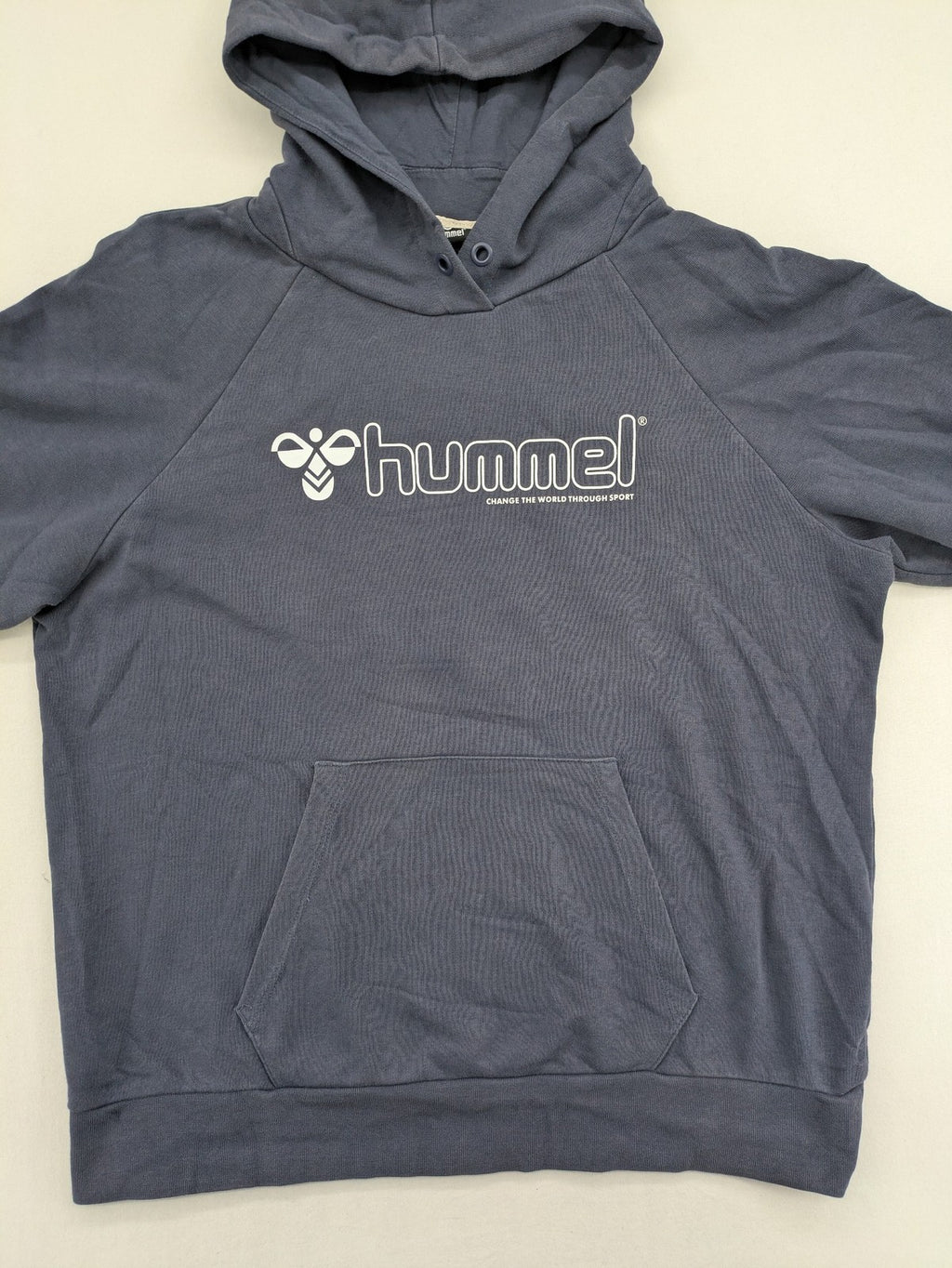 Hummel grey turtle neck jumper featuring large logo, kangaroo pocket, cotton blend material.
