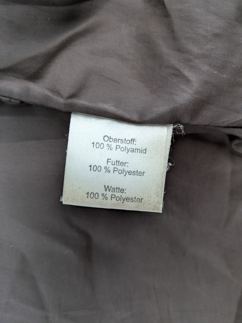 Camargue grey quilted jacket with fleece collar and buttoned pockets.