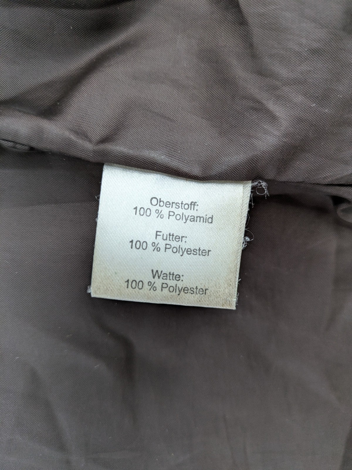 Camargue grey quilted jacket with fleece collar and buttoned pockets.