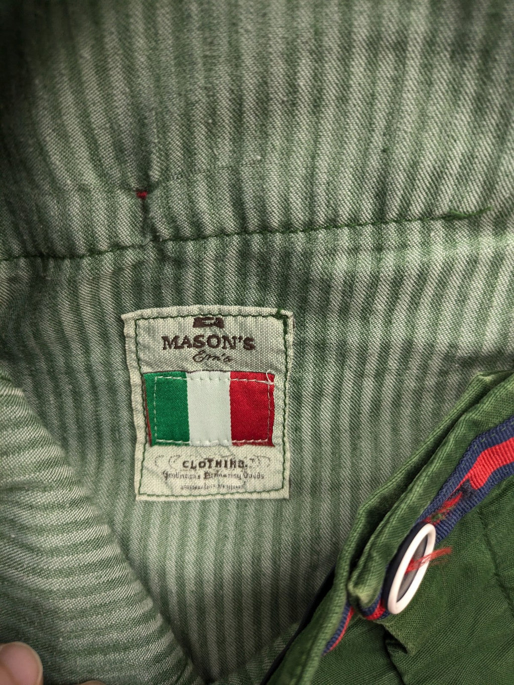 Mason's green chino pants with striped red and blue waistband, cotton stretch material.