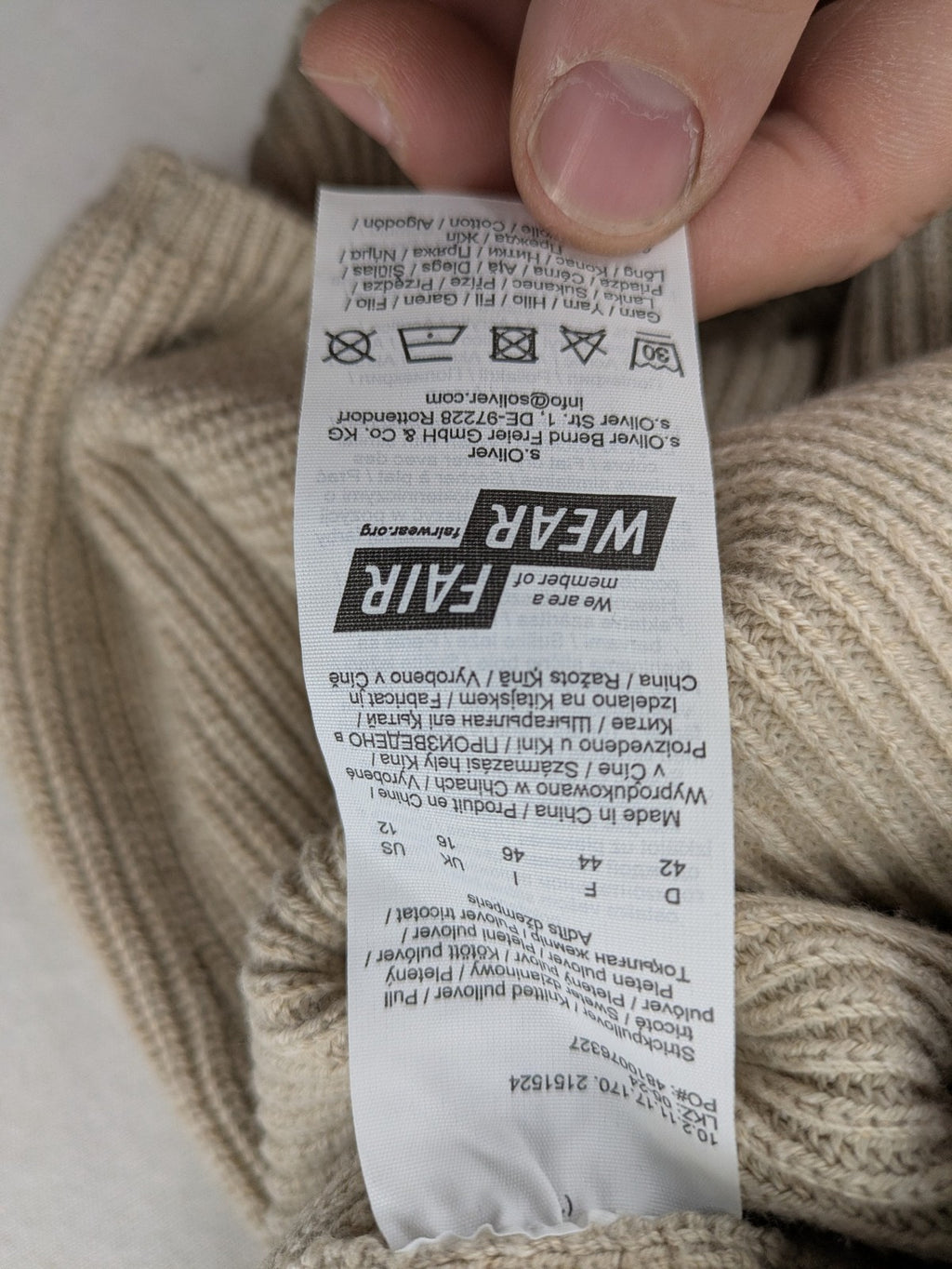 s.Oliver beige turtle neck jumper with V-neck, ribbed texture, and raglan sleeves