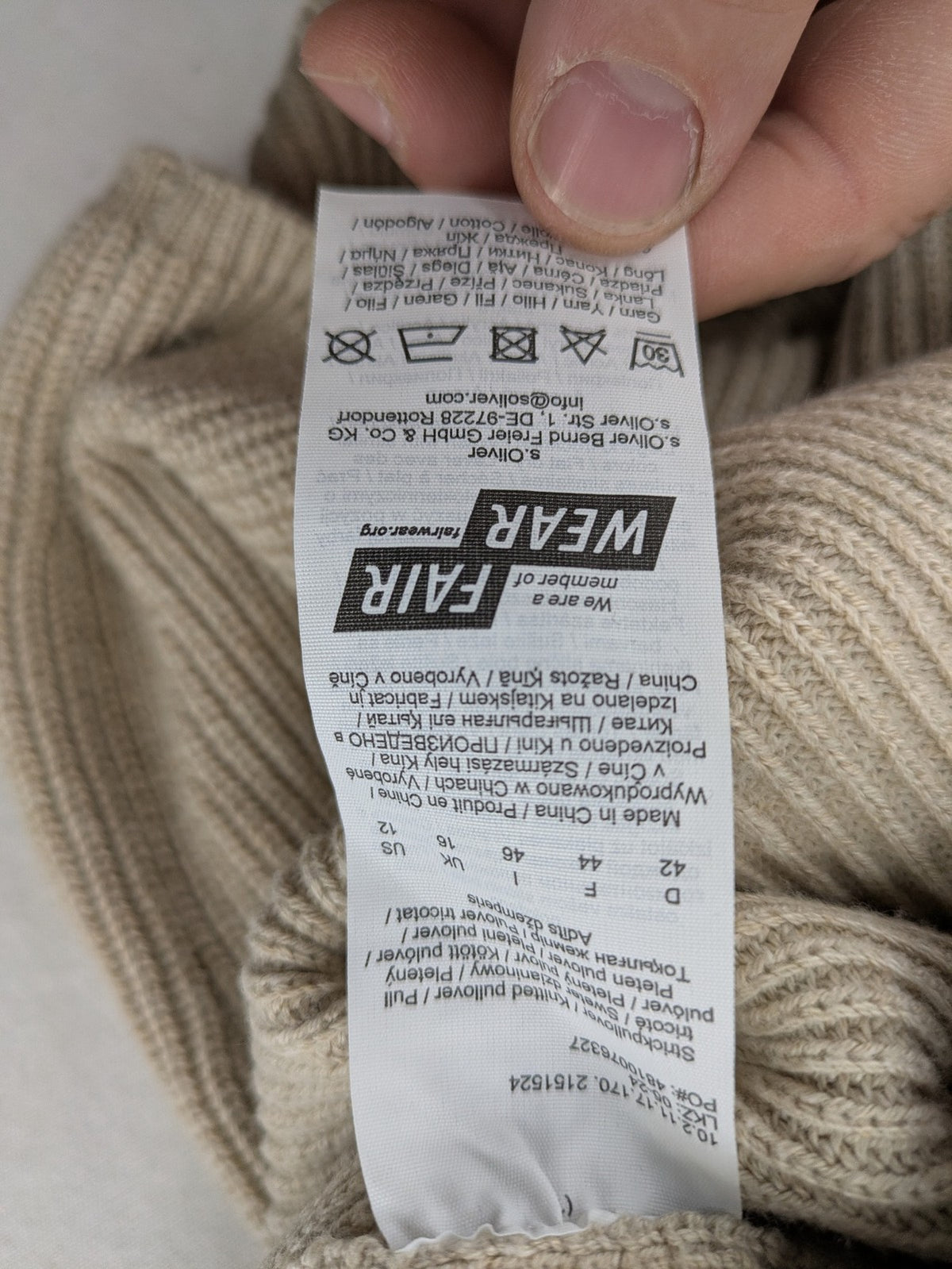 s.Oliver beige turtle neck jumper with V-neck, ribbed texture, and raglan sleeves