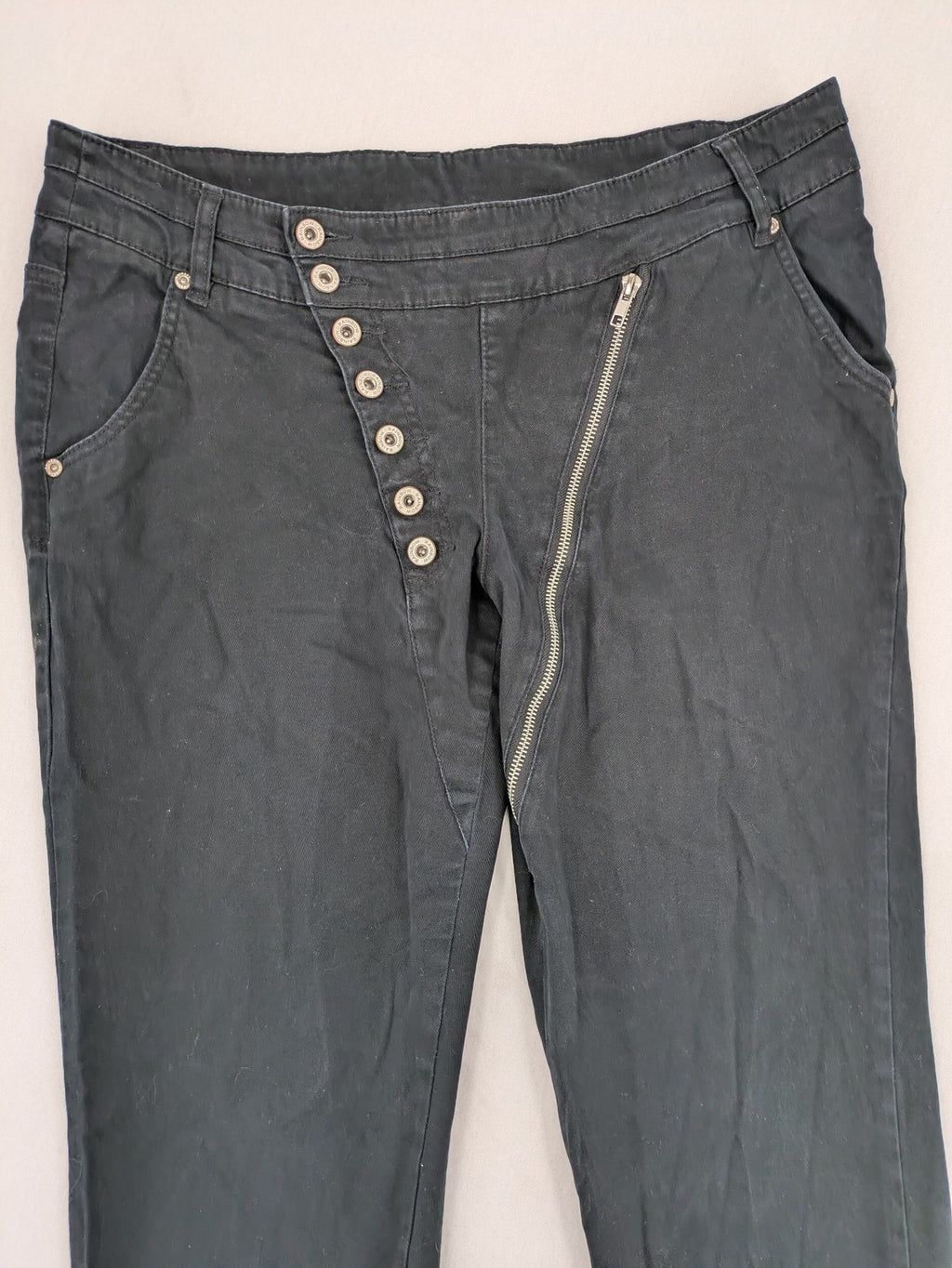 REI grey pants asymmetrical design with diagonal zipper and button placket, cotton blend.