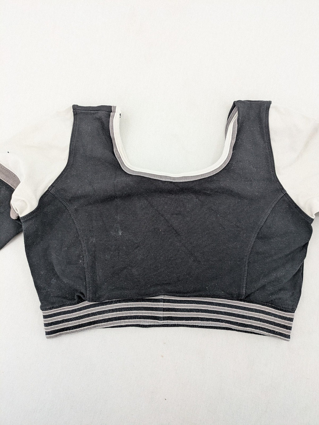 Adidas long sleeve crop top black grey white color-blocking with embroidered logo.
