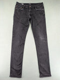 Jack & Jones black slim fit jeans faded wash stretch denim with logo detail.