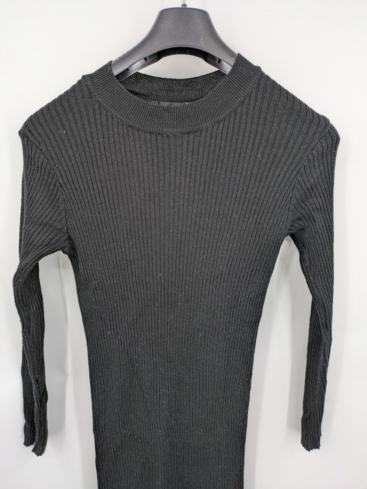 Atmosphere black bodycon midi dress with ribbed texture and long sleeves.