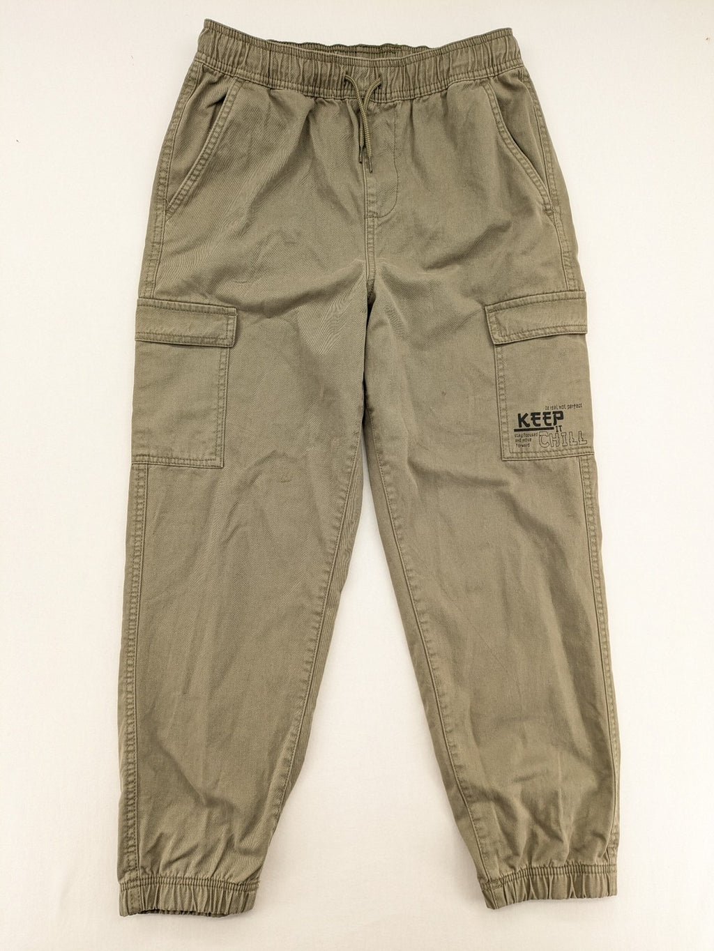 Y.F.K. khaki cargo pants with elastic cuffs, side pockets, and drawstring waistband.